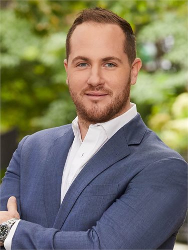 Jacob Henderson, a top real estate agent in New York City for Corcoran, a real estate firm in Williamsburg Driggs.