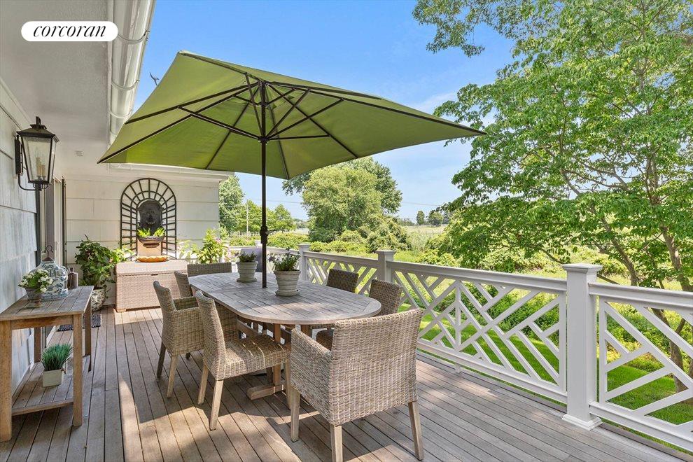 The Hamptons Real Estate | View 1216 Deerfield Road | Living room Deck with Views