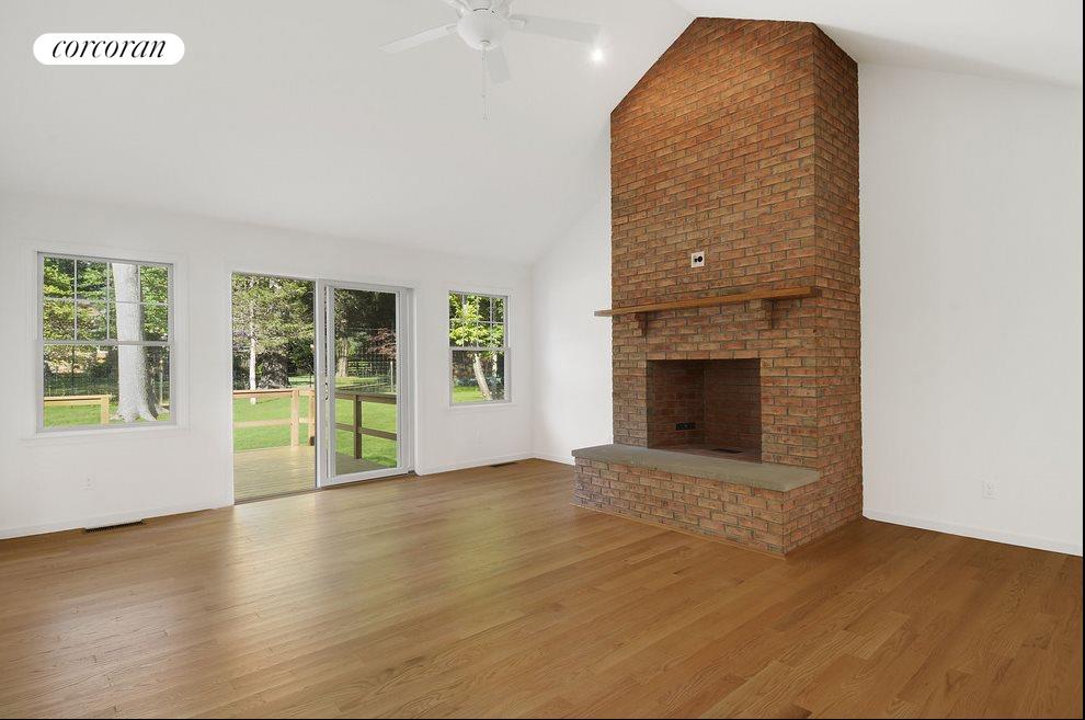 New York City Real Estate | View  | Living Room with brick fireplace | View 7