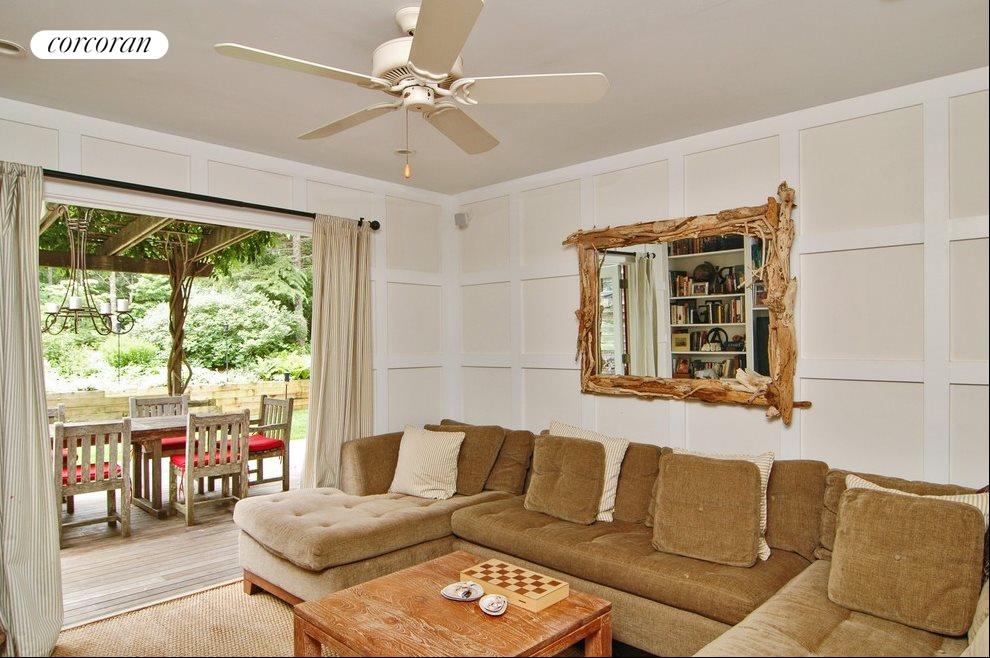 New York City Real Estate | View 181 Springy Banks Road | Den with Views of Garden | View 4