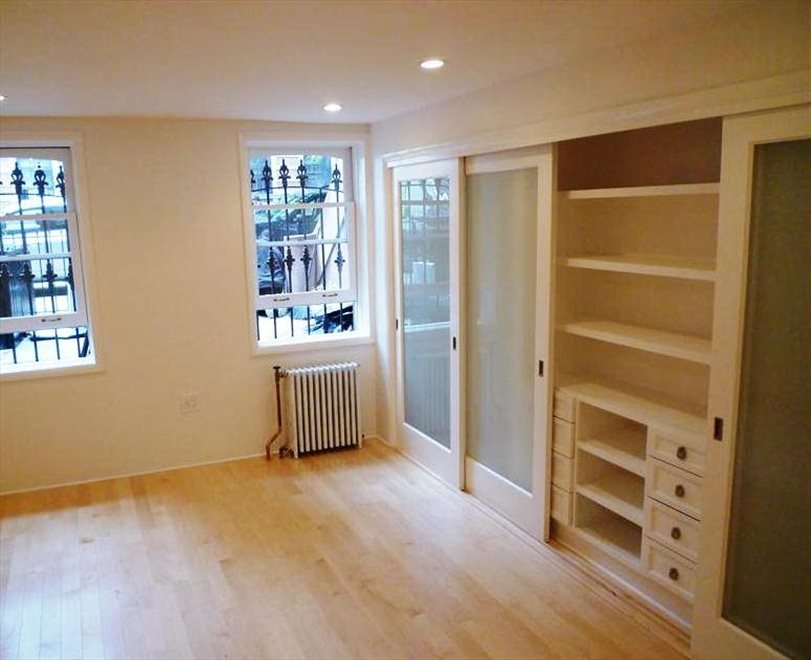 New York City Real Estate | View 133 Saint James Place, garden | organized closet with sliding doors | View 2