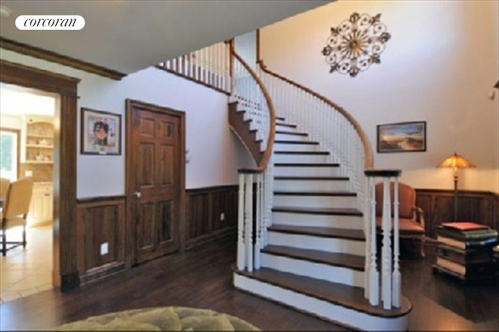 New York City Real Estate | View  | Entry with suspended curved staircase | View 3