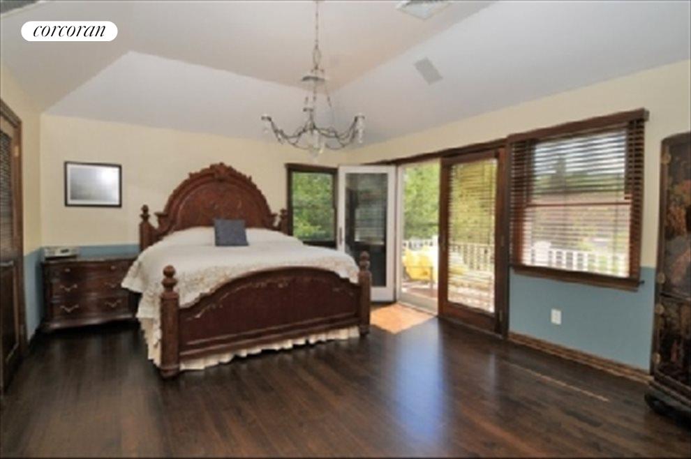 New York City Real Estate | View  | Master bedroom with French doors to waterside deck | View 7
