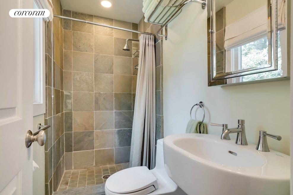 New York City Real Estate | View 128 Harbor Blvd. | Downstairs Bathroom | View 9