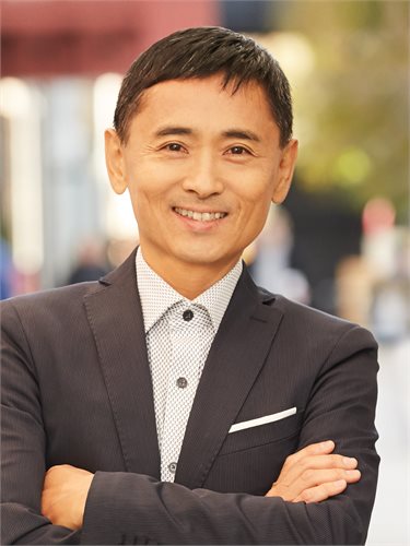Toshi Mochizuki, a top real estate agent in New York City for Corcoran, a real estate firm in Brooklyn Heights.