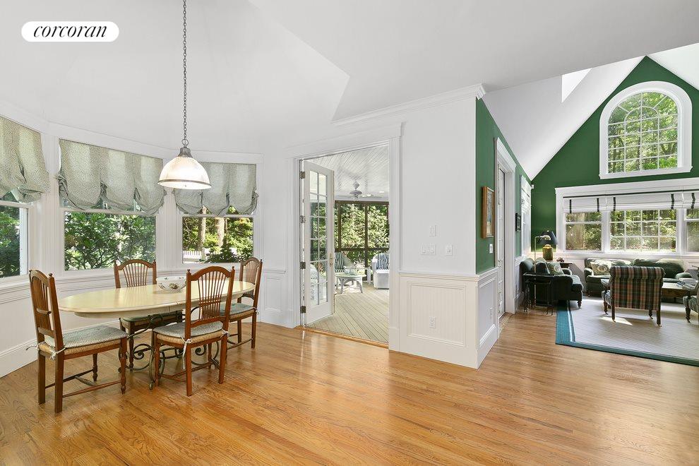 New York City Real Estate | View  | View from kitchen toward breakfast nook (L), Screened porch (ahead) and Den (R) | View 6