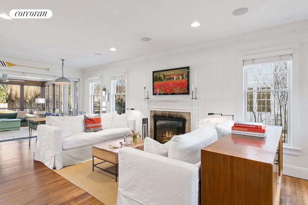 New York City Real Estate | View  | Open Living and Dining Area with Wood-Burning Fireplace | View 3