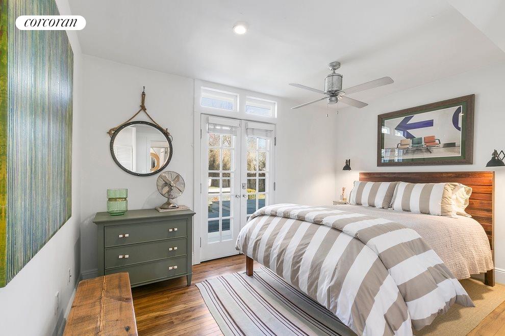 New York City Real Estate | View  | Guest Bedroom with French Doors to Back Deck | View 6