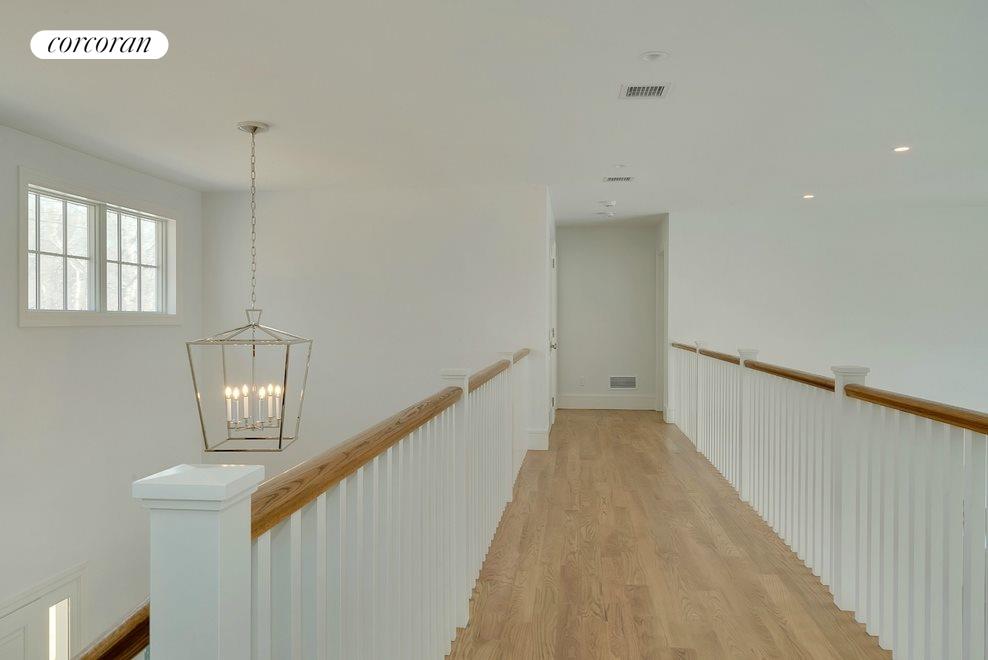 New York City Real Estate | View 69 Ely Brook to Hands Creek Road | Catwalk spanning entryway and living area | View 17